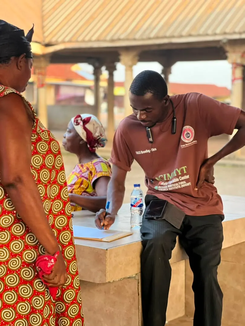 A Foundation representative registers a resident during the engagement at Akyawkrom